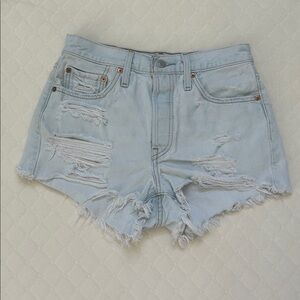 Levi’s | Light Blue Wash Distressed Raw Hem Jean Shorts | 27 | 2”